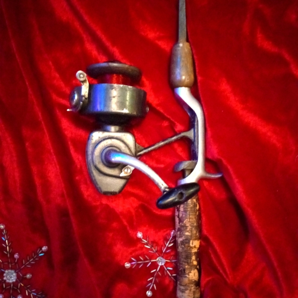 Antique steel rod fishing pole